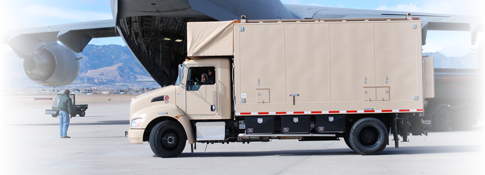 Dual (two) 55,000 BTU/Hr continuous run environmental control units mounted over the cab for electronics.